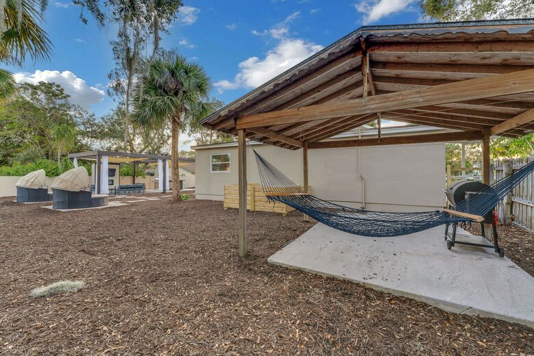 Grand Florida Estate with Heated Pool and Backyard Oasis - Merritt Island, Florida