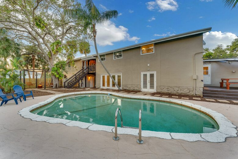 Grand Florida Estate with Heated Pool and Backyard Oasis - Merritt Island, Florida