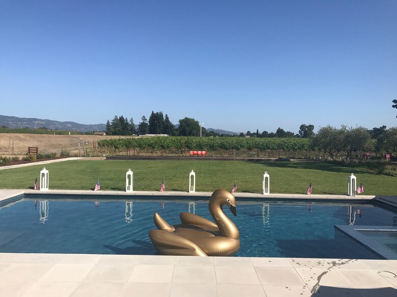 The large pool with built-in spa looking south.