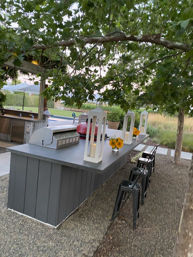 2nd outdoor bar with TV, pizza oven, charcoal and gas grills