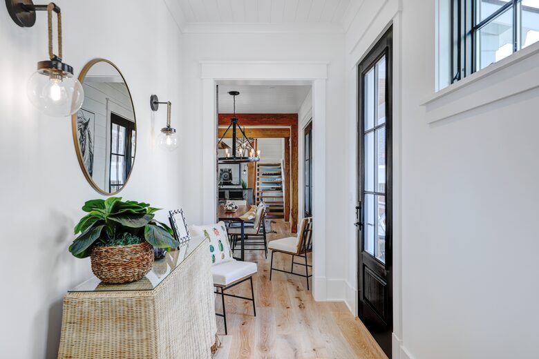 hallway from guest suites to great room, kitchen & dining