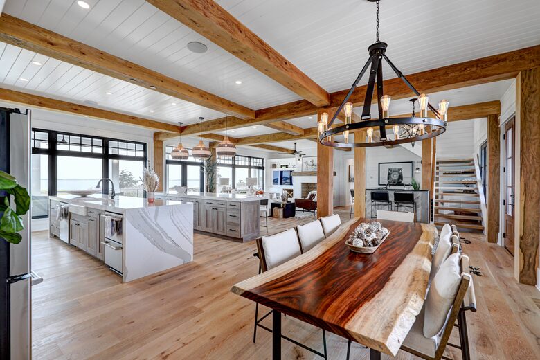great room showing natural wood dining table in foreground