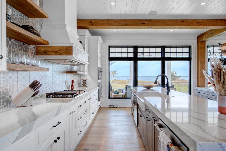kitchen looking out to porch and bay