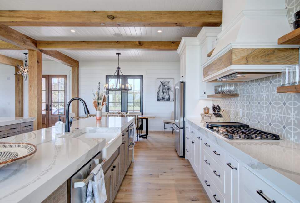 kitchen showing inner island and range