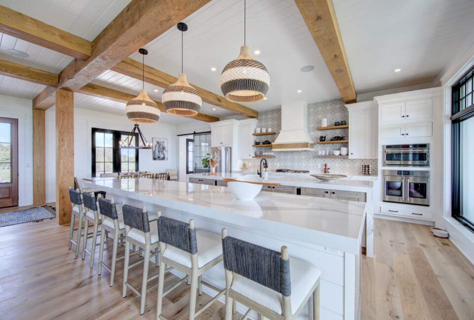 ktichen highlighting outer island with bar stools