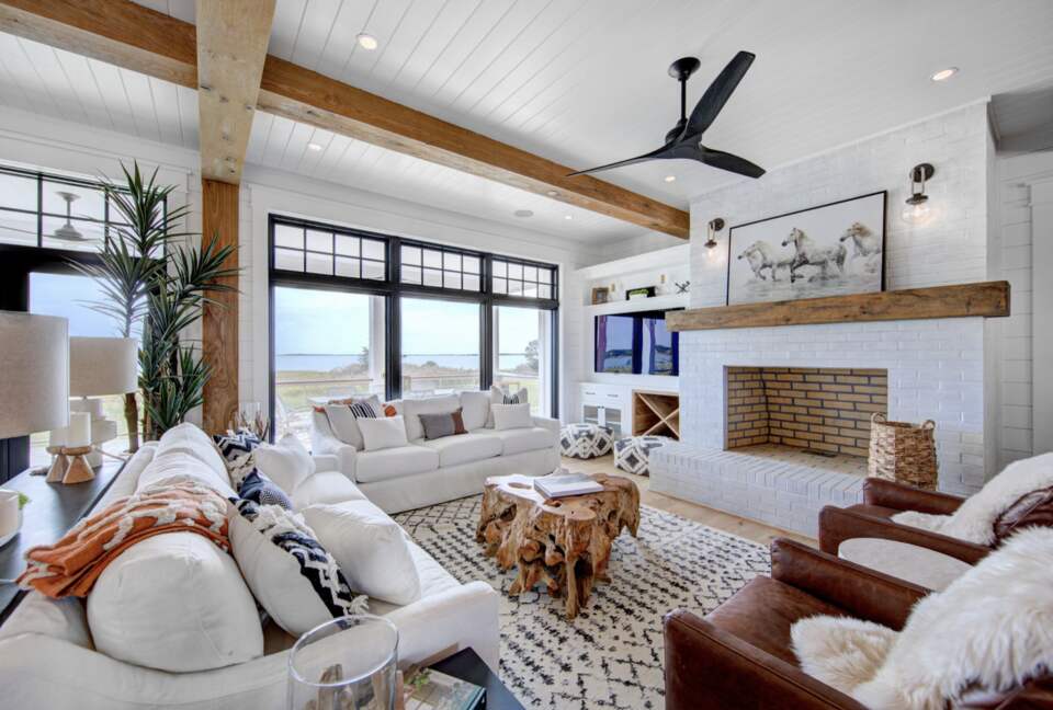 Great room showing large masonry fireplace (not inset)