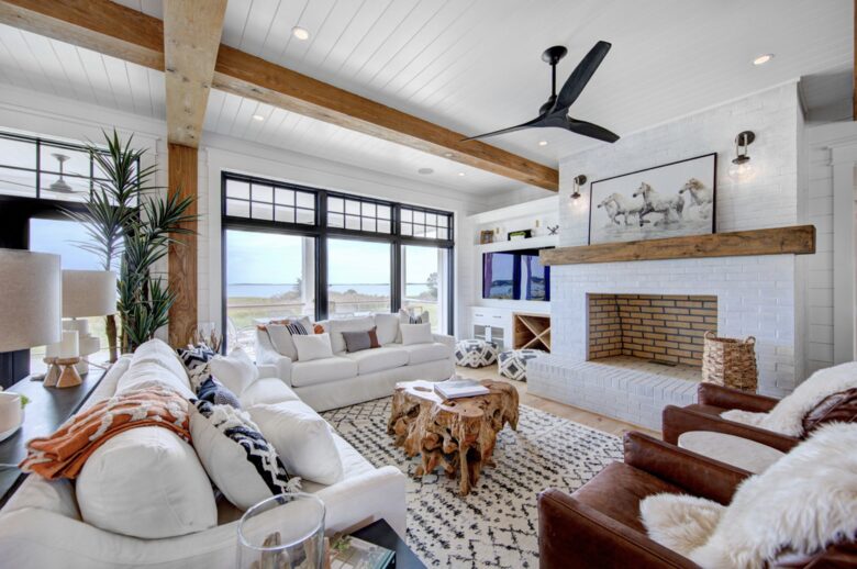 Great room showing large masonry fireplace (not inset)