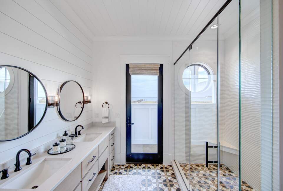 master bathroom facing door to outside shower