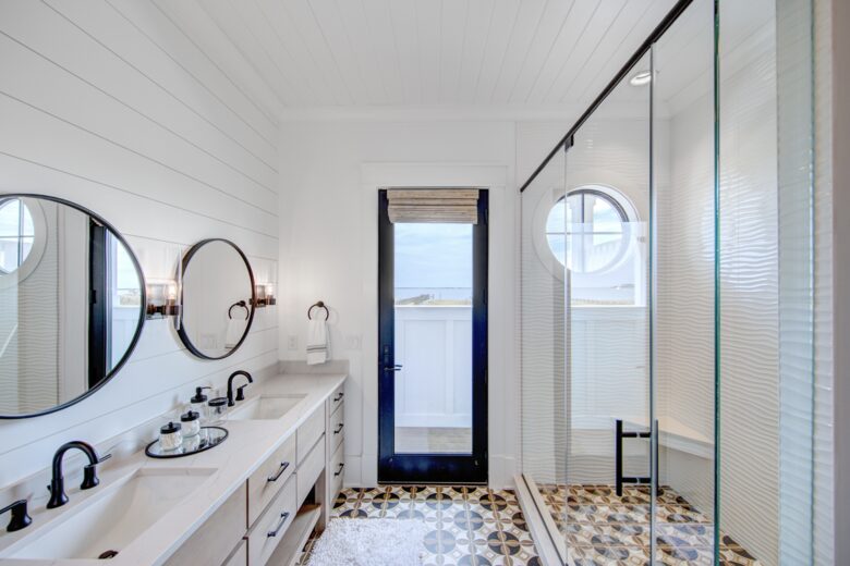 master bathroom facing door to outside shower