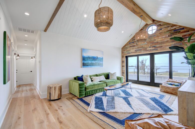 upstairs tv and play room with large balcony