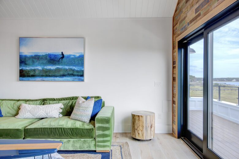 upstairs play and tv room with large balcony