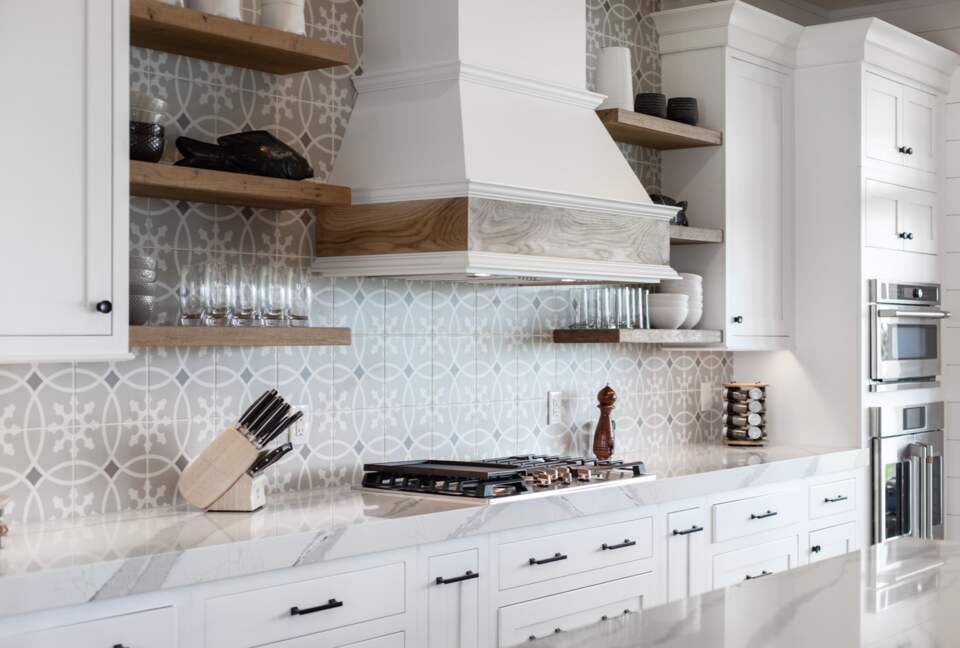 kitchen range and tile backsplash