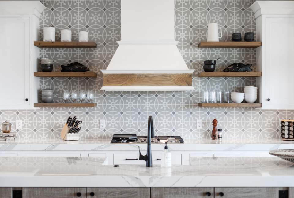 kitchen range and tile backsplash