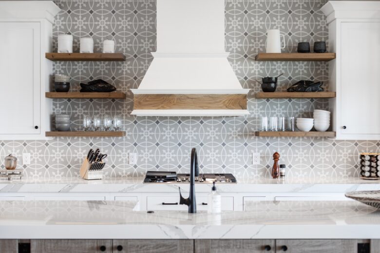 kitchen range and tile backsplash