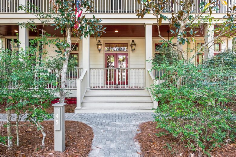 50 ft of porches surround house. Front has 2 swings & rocking chairs.