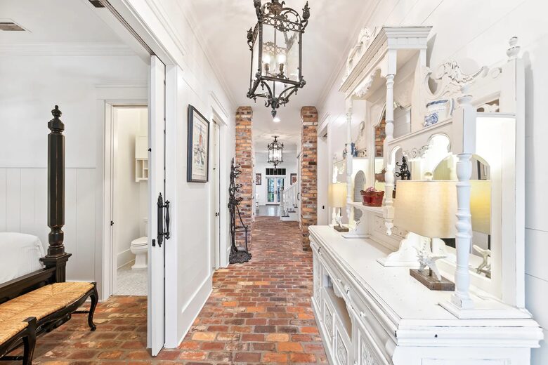 New Orleans inspired brick 'carraige house" entrance.