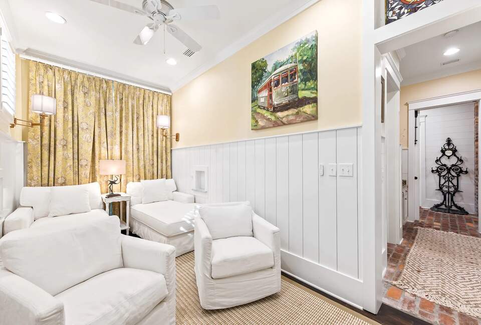 Media room adjacent to master suite for movies & private escape.