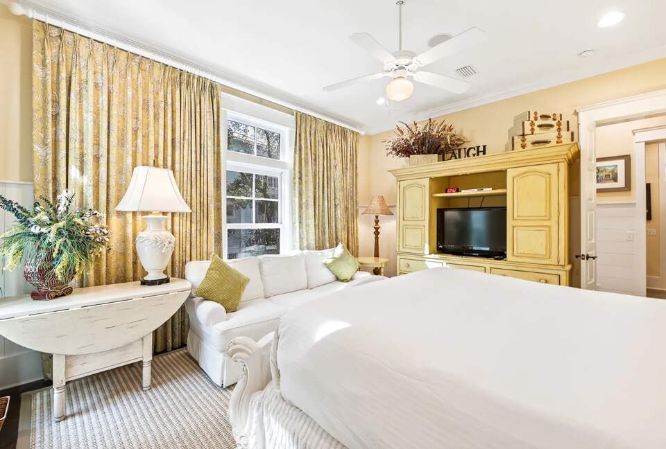 Master K suite downstairs with sofa for relaxing away.