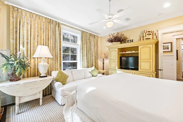 Master K suite downstairs with sofa for relaxing away.