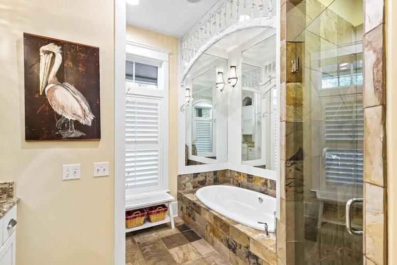 Master soaking tub plus enclosed showerhead & rainhead.