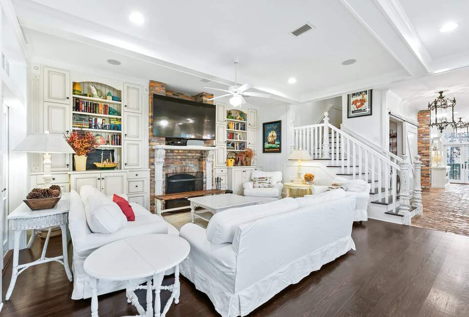 Abundant sofa/chair seating for large groups to visit or TV.