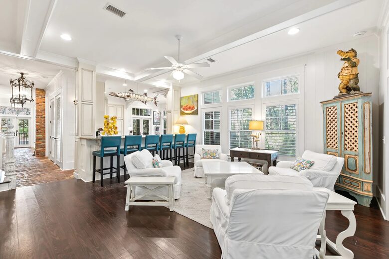 Bonus bar for 6 with comfort seating at opposite end of TV.