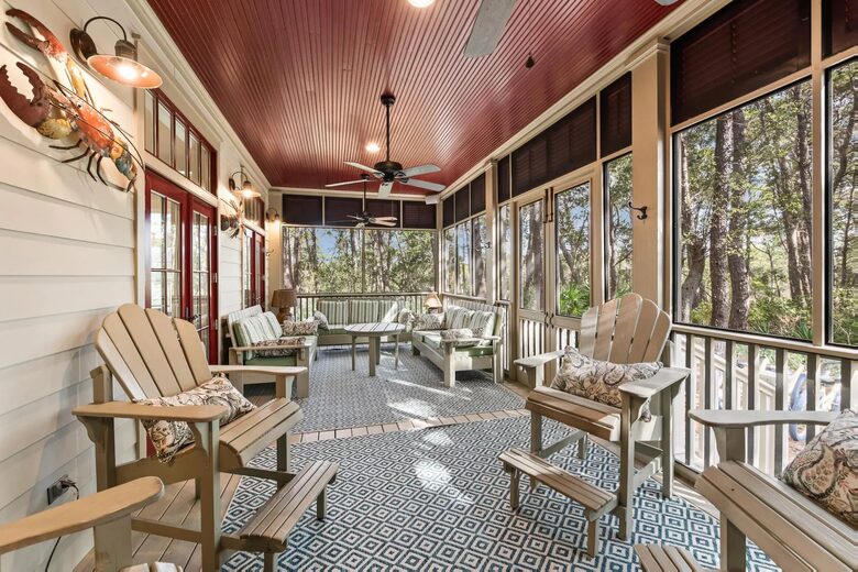 1st fl screened porch in woods, off den, xxx seating areas.