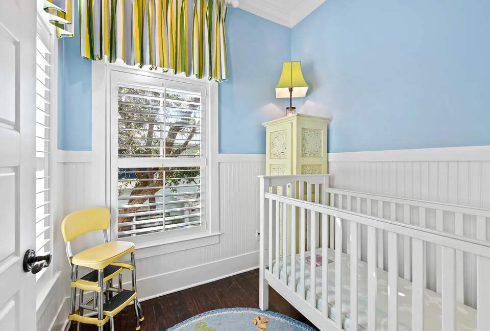 Private full crib room connected to 2 separate bunk beds.