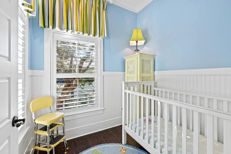 Private full crib room connected to 2 separate bunk beds.