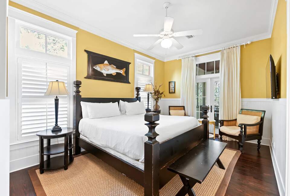 K suite with double closet & doors to screen sleeping porch