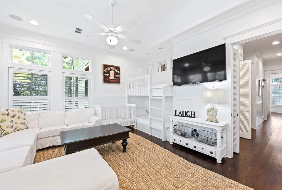 Media room, sectional sofa, 2 bonus bunks & full crib.