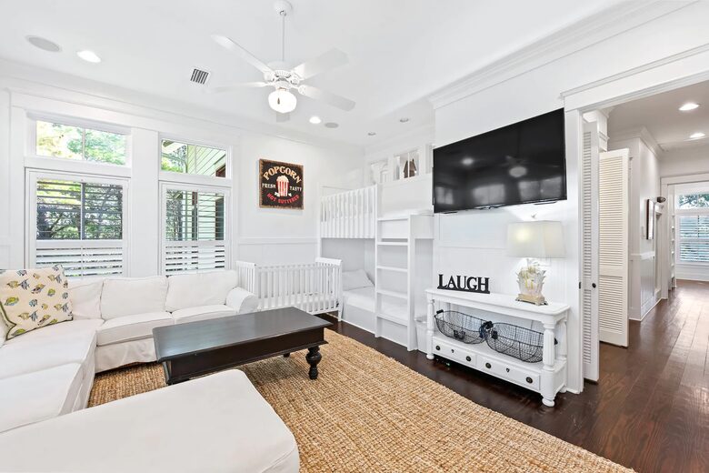 Media room, sectional sofa, 2 bonus bunks & full crib.