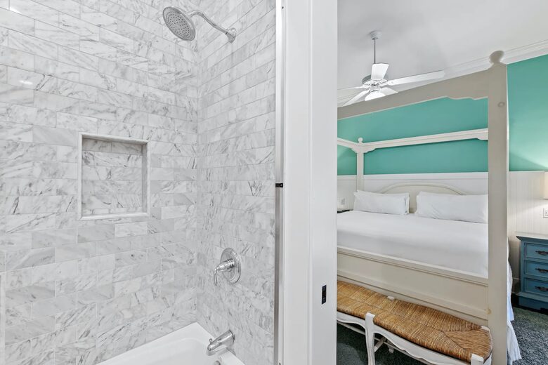 Teal K Suite with soaking tub/shower combo, large vanity.