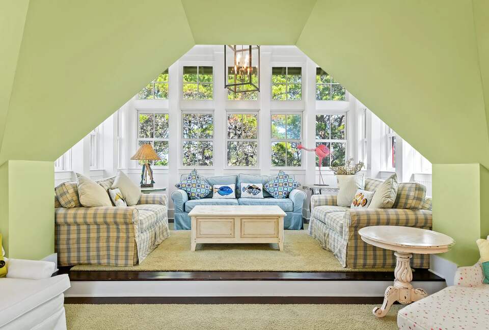 3 Story Tower overlooking dune lake and tree tops.