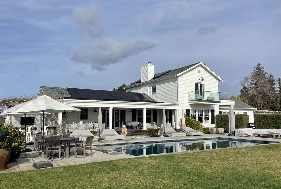 The pool, south deck, and outdoor bar area.