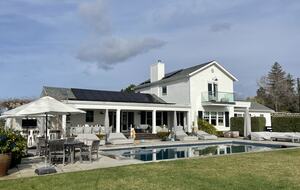 The pool, south deck, and outdoor bar area.