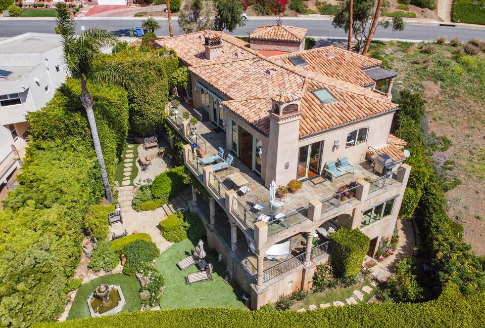 Drone view of West gardens and Villa