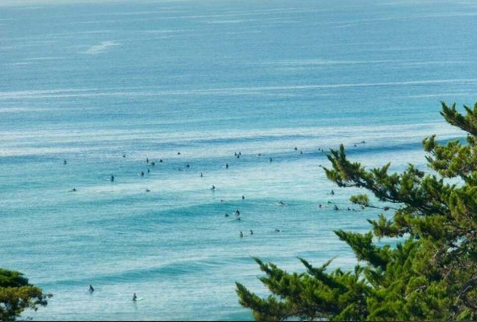 Surfers at our County Line Beach seen from Villa