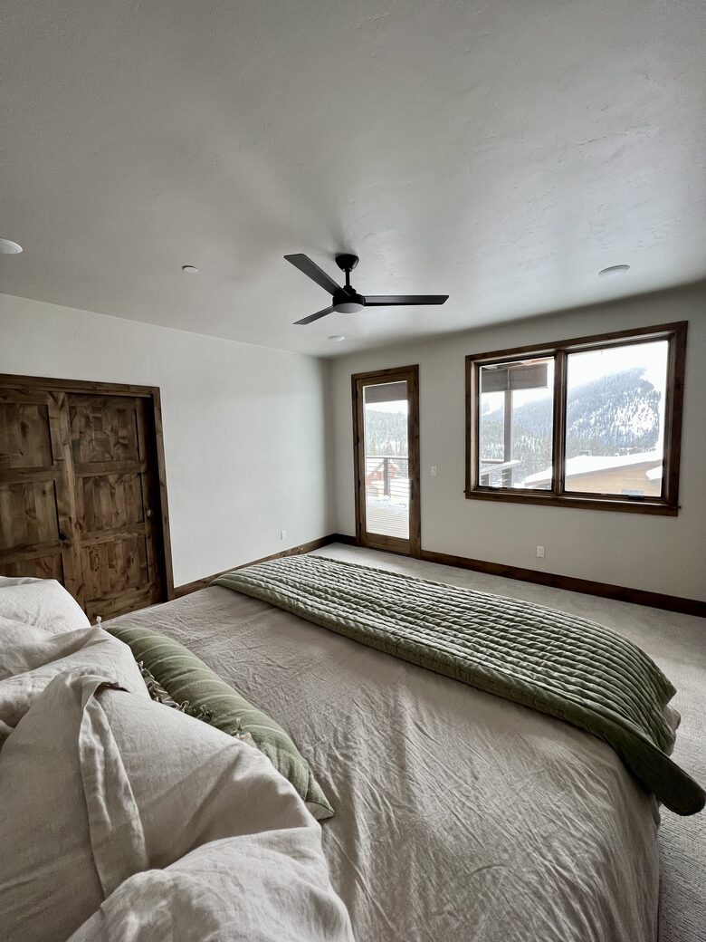 Master bedroom with King bed on middle level with deck access