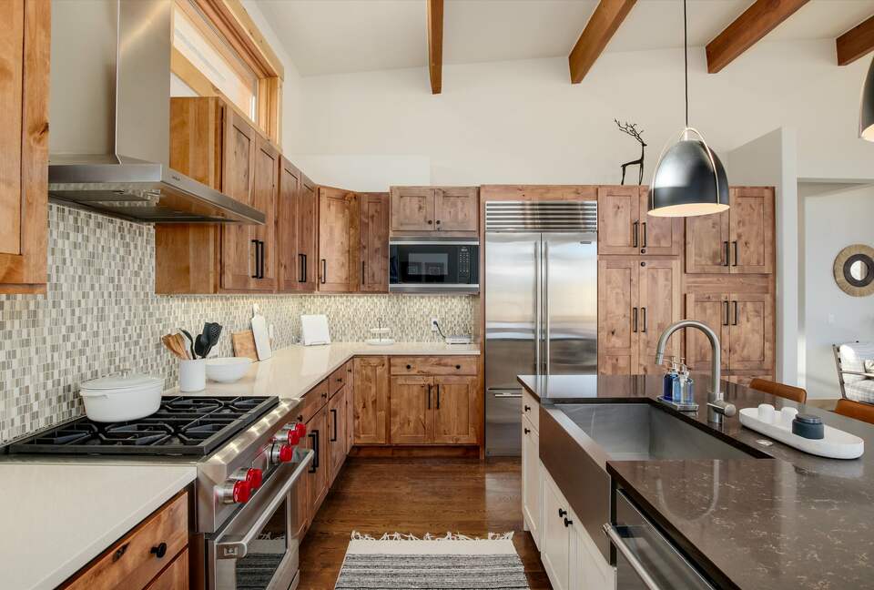 Wolf gas range and SubZero refrigerator