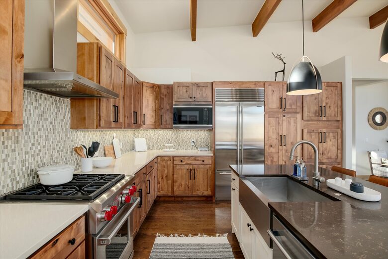 Wolf gas range and SubZero refrigerator