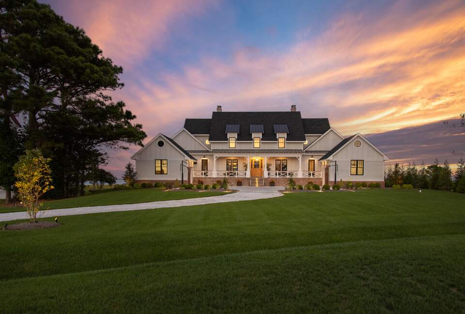 front of home at dusk - large front yard