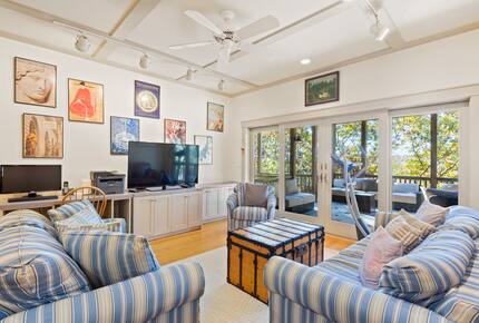 Lower level Family room with view of lower deck seating area