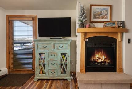 Fireplace, entertainment center, balcony door