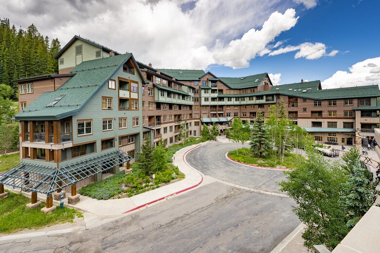 Slopeside Building in Summer