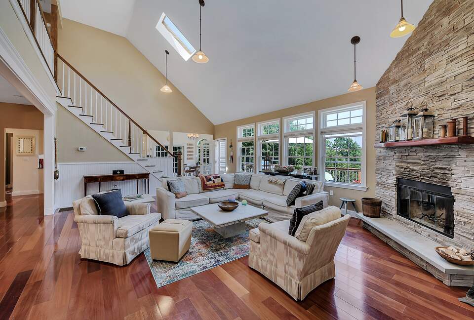 LIVING ROOM WITH FIREPLACE AND TV