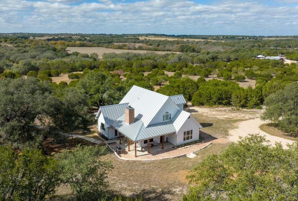 12 Acre Designer Farmhouse | TX Hill Country - Stonewall, Texas