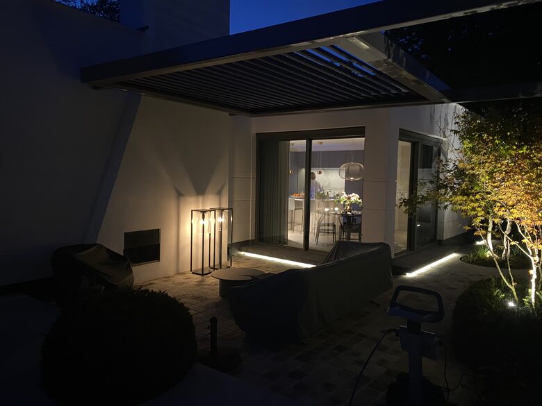 Outside fireplace under pergola