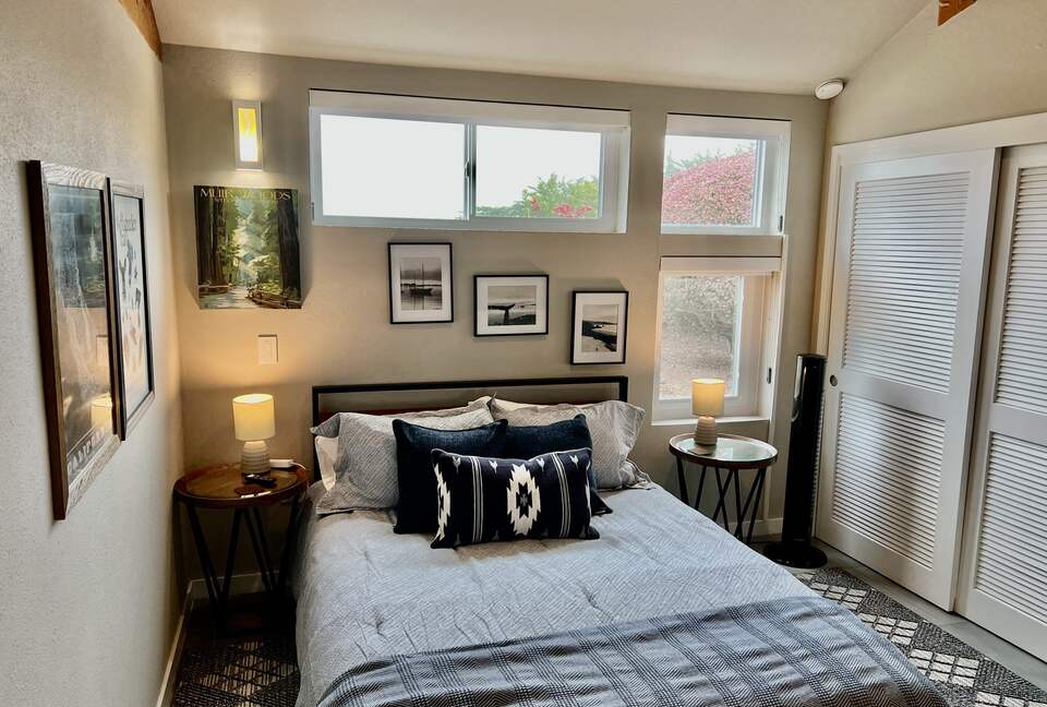 Downstairs bedroom with queen bed