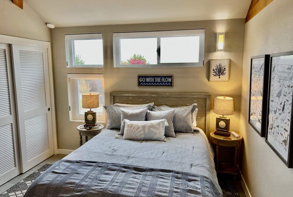 Downstairs bedroom with queen bed